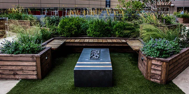 Concrete fire pit on rooftop deck